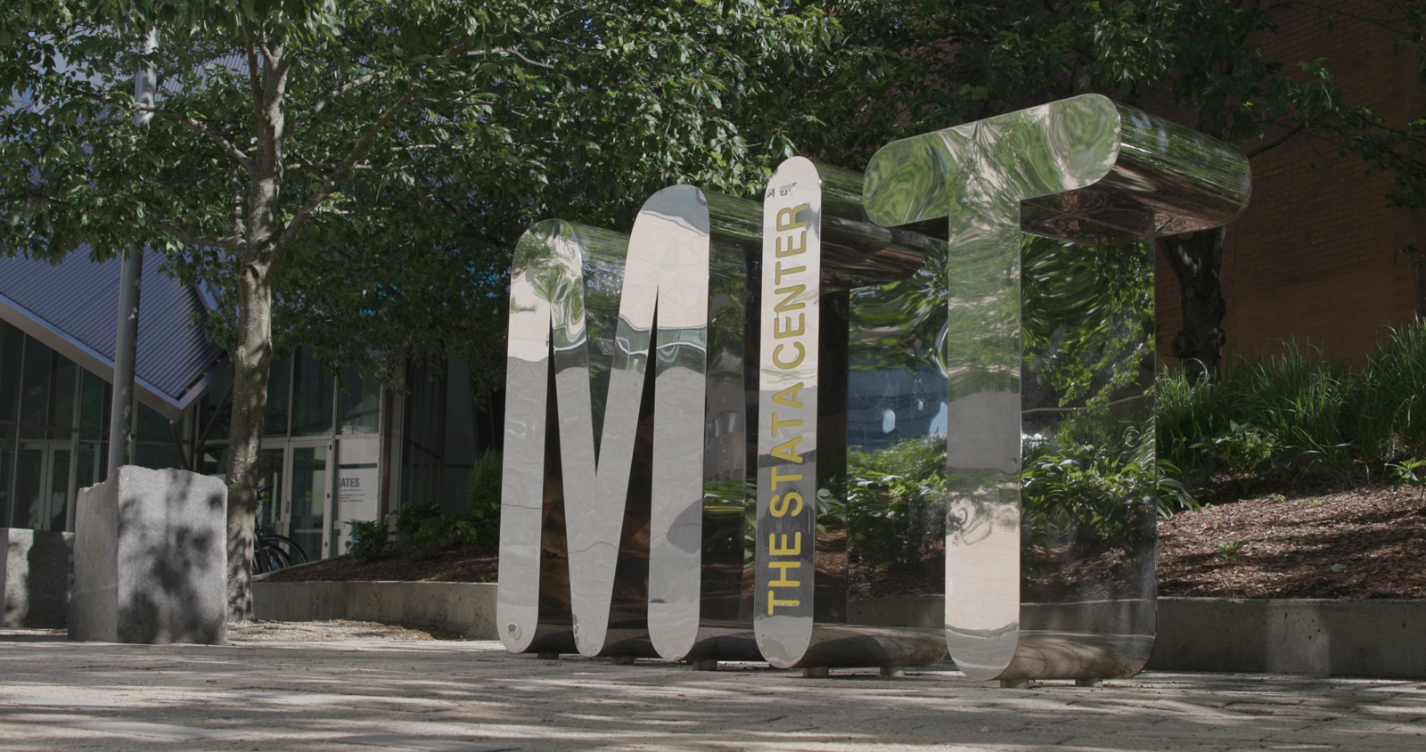 An MIT sign, written in large reflective letters.